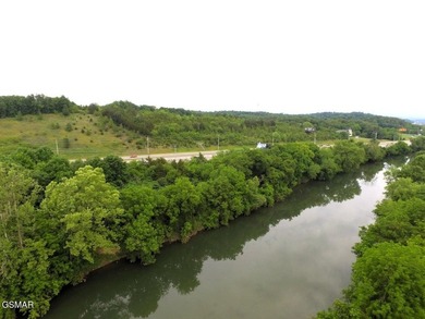 7.61+/- Acres, 1,912' of frontage on Winfield Dunn Parkway, Hwy - photo 6