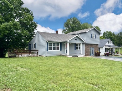 Welcome home to this spacious 5-bedroom, 2-bath property located - photo 1