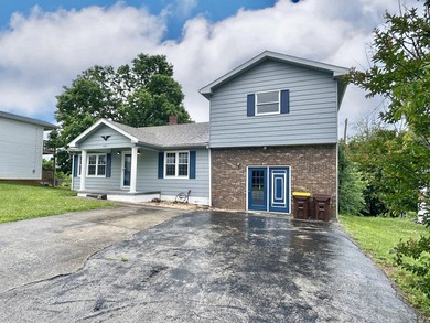 Welcome home to this spacious 5-bedroom, 2-bath property located - photo 2