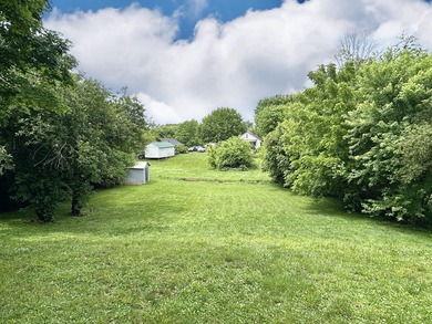 Welcome home to this spacious 5-bedroom, 2-bath property located - photo 3