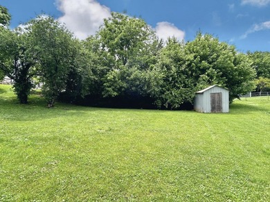 Welcome home to this spacious 5-bedroom, 2-bath property located - photo 4