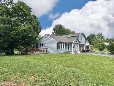 Welcome home to this spacious 5-bedroom, 2-bath property located - photo 7