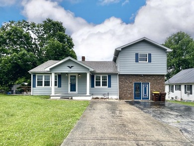Welcome home to this spacious 5-bedroom, 2-bath property located - photo 9