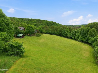 Spanning approximately 62.96 total combined acres between two - photo 4