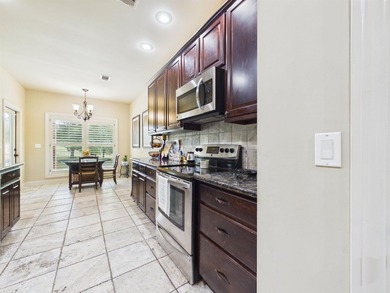 Beautiful 3 bed, 2 bath brick home on the golf course in The - photo 12