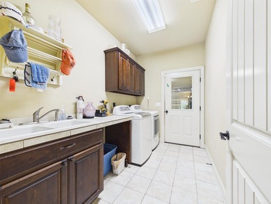 Beautiful 3 bed, 2 bath brick home on the golf course in The - photo 14