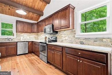 This light and bright 4 BR with 2 Full Bath design home is a - photo 9