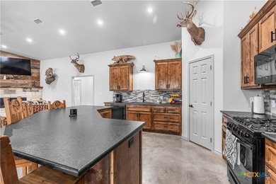 THIS IS THE ONE! This stunning 4-bedroom, 3-bath open-concept - photo 9