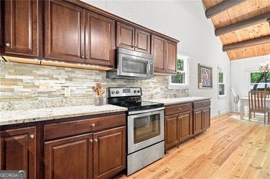 This light and bright 4 BR with 2 Full Bath design home is a - photo 10