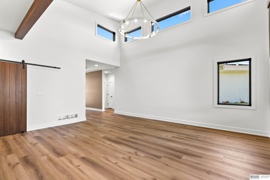 Wow! Sleek and modern 3 bed, 3 bath, 3 car ranch boasting 9 ft - photo 4
