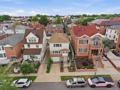Welcome to this well-maintained two-family home offering an - photo 2