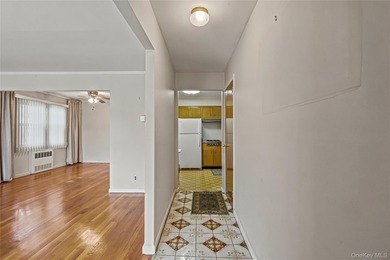 Welcome to this well-maintained two-family home offering an - photo 3