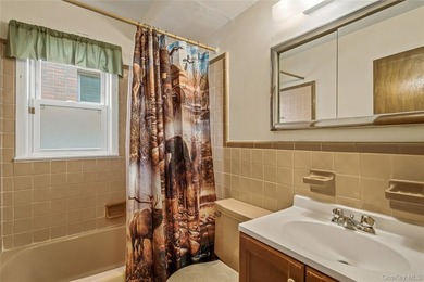 Welcome to this well-maintained two-family home offering an - photo 10