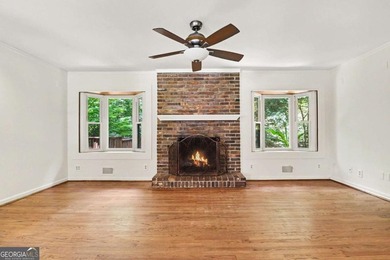 This charming split-level home with a rocking chair front porch - photo 15