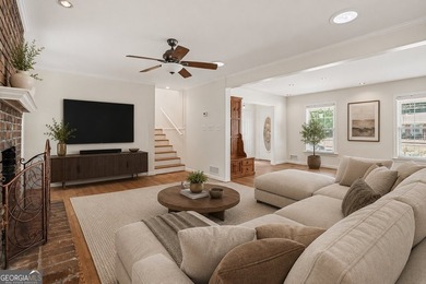 This charming split-level home with a rocking chair front porch - photo 16