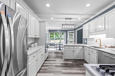 TRADITIONAL TWO STORY FAIRWAY HOME IN GREAT WATERS AT REYNOLDS - photo 21