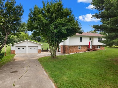 WHITE PINE, This charming 4 bedroom, 1.5 bath home is situated - photo 2