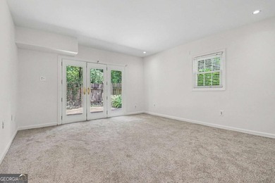 This charming split-level home with a rocking chair front porch - photo 28