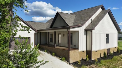 Experience premier lakeside living in this stunning new - photo 1
