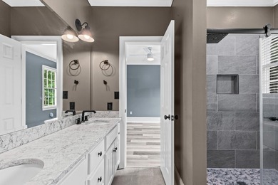 TRADITIONAL TWO STORY FAIRWAY HOME IN GREAT WATERS AT REYNOLDS - photo 34