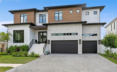 Located on spectacular Davis Islands, this newer construction - photo 1