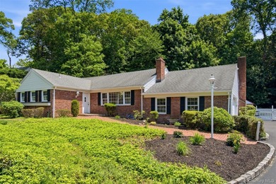 Perfectly situated brick ranch with beautiful curb appeal. This - photo 1