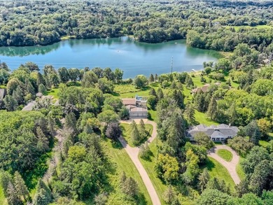 Situated on over five acres along the shores of Sunfish Lake - photo 2