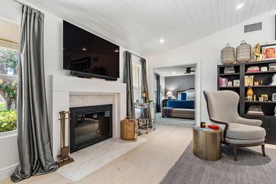 Nestled on an oversized, beautifully landscaped lot in the - photo 11