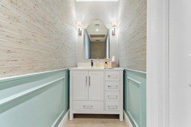 Nestled on an oversized, beautifully landscaped lot in the - photo 16