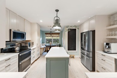 Nestled on an oversized, beautifully landscaped lot in the - photo 18