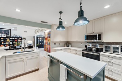 Nestled on an oversized, beautifully landscaped lot in the - photo 20