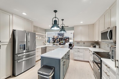 Nestled on an oversized, beautifully landscaped lot in the - photo 21