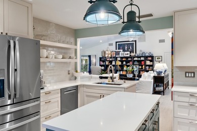 Nestled on an oversized, beautifully landscaped lot in the - photo 22