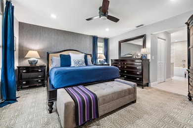 Nestled on an oversized, beautifully landscaped lot in the - photo 27