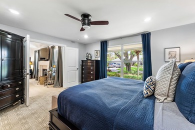 Nestled on an oversized, beautifully landscaped lot in the - photo 28