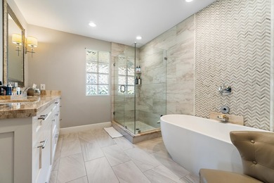Nestled on an oversized, beautifully landscaped lot in the - photo 32