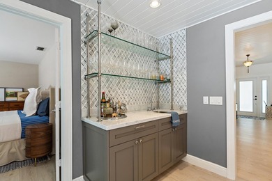 Nestled on an oversized, beautifully landscaped lot in the - photo 38
