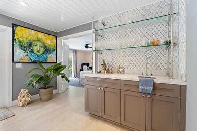 Nestled on an oversized, beautifully landscaped lot in the - photo 39