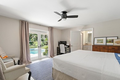 Nestled on an oversized, beautifully landscaped lot in the - photo 40