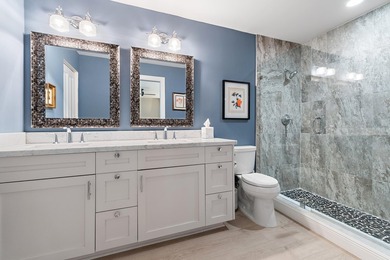 Nestled on an oversized, beautifully landscaped lot in the - photo 49