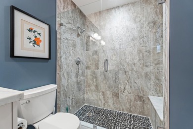 Nestled on an oversized, beautifully landscaped lot in the - photo 50