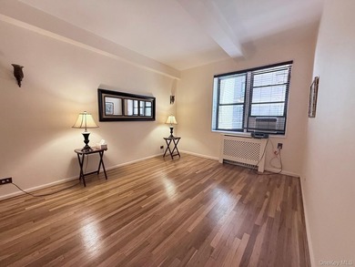Well-proportioned one-bedroom co-op featuring a spacious living - photo 5
