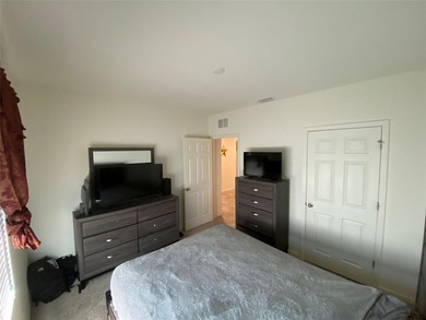 Step into this inviting 3-bedroom, 2-bath home located in the - photo 12