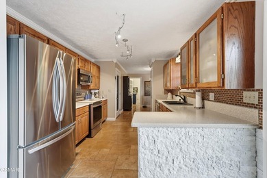 Welcome home to this charming one-level stone front ranch - photo 7