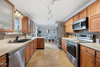 Welcome home to this charming one-level stone front ranch - photo 8