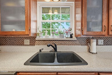 Welcome home to this charming one-level stone front ranch - photo 9