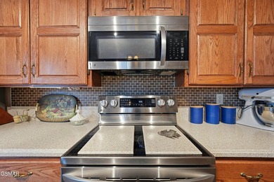 Welcome home to this charming one-level stone front ranch - photo 10