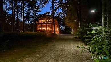 Welcome to Beach Pond's premier private waterfront estate. Set - photo 36