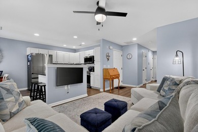 This recently renovated townhome, with updates that actually - photo 3