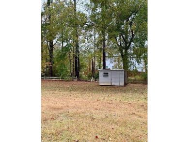 Nestled at 1840 Flat Shoals Road SE, Conyers, GA, this inviting